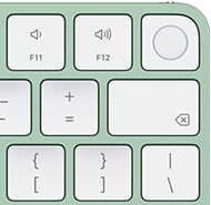 Magic Keyboard, obere rechte Ecke, Farbe Grün, Touch ID, Löschtaste und Funktionstasten für die Lautstärke