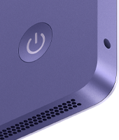 iMac, Rückseite in der Farbe Violett mit Ein/Aus-Taste, Kopfhöreranschluss und Lautsprechergitter