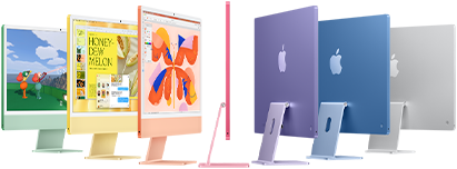 Sieben iMac Modelle in Grün, Gelb, Orange, Pink, Violett, Blau und Silber in einer aufgefächerten Anordnung